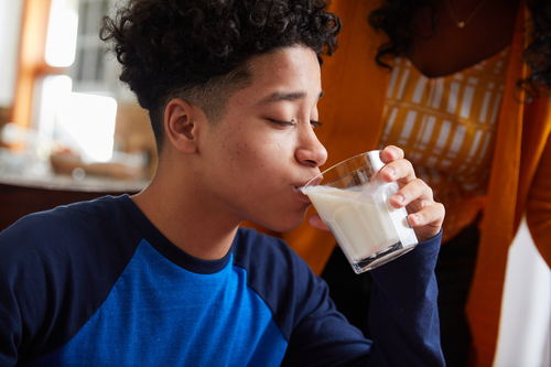 Teen Drinking Milk