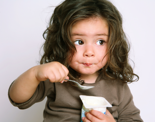 girl eating yogurt